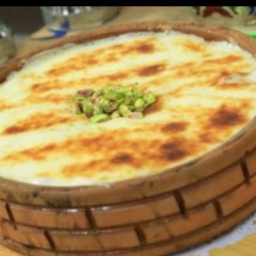 طاجن ام علي بالمكسرات والقشطه