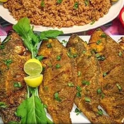 وحبة سمك بلطى مقلى ١ سمك ٣٠٠جرام مع أرز صيادية مع طحينة مع سلطة