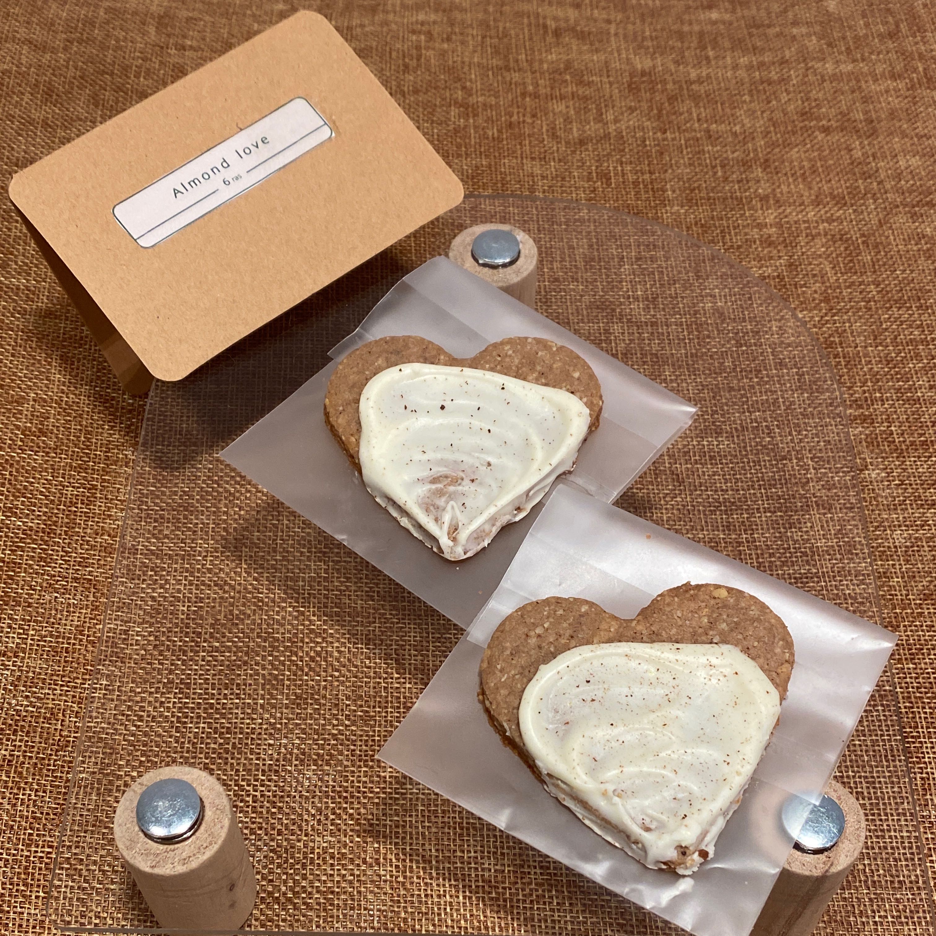 almond love 
nutty and chocolaty flavors with a surprising spice and balanced sweetness coated with white chocolate 
an elegant treat for an elegant moment