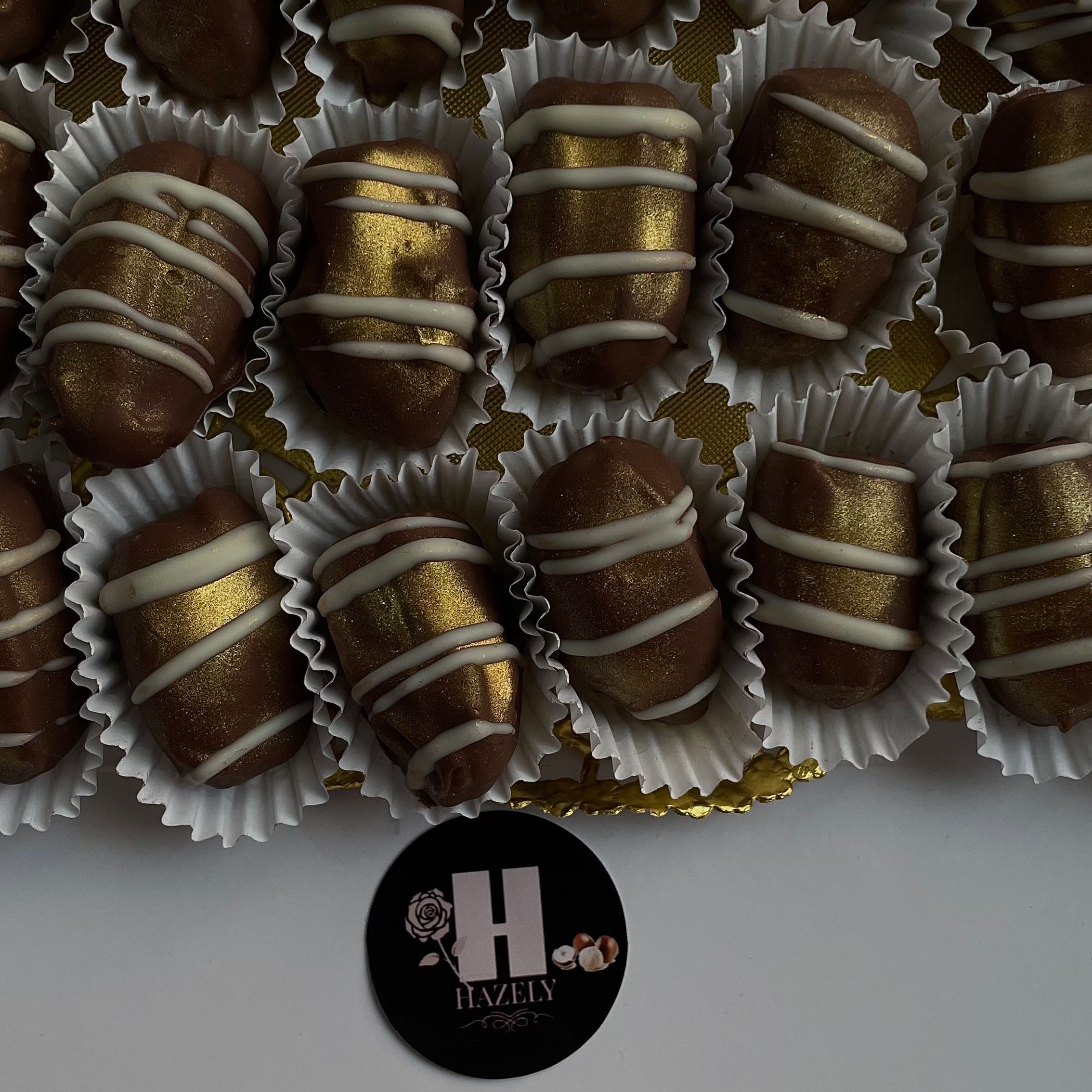 تمر محشي باللوز ومغطى بالكاكو البلجيكي الفاخر 
البوكس يحتوي على 40 حبه