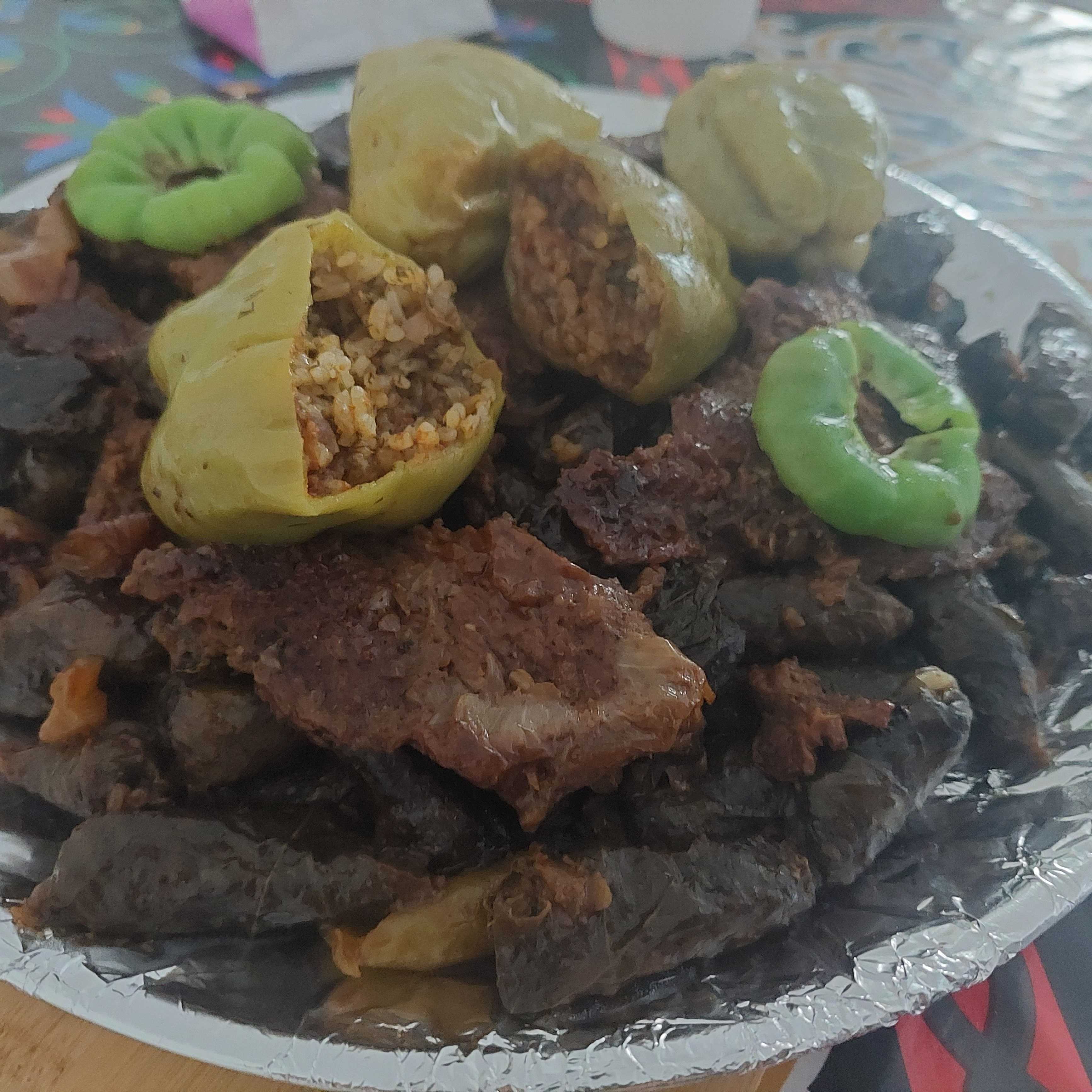 نص كيلو محشي ورق عنب  بدبس الرمان و ربع بوفتيك