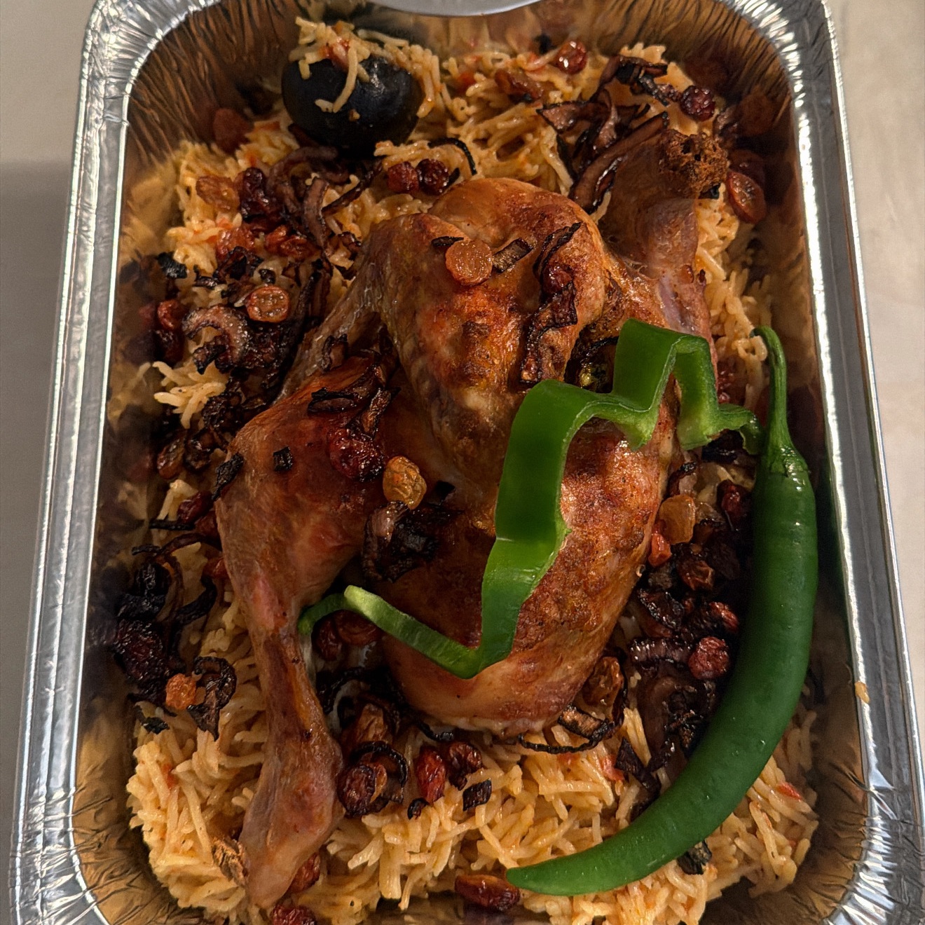 نص حبة دجاج مع الرز