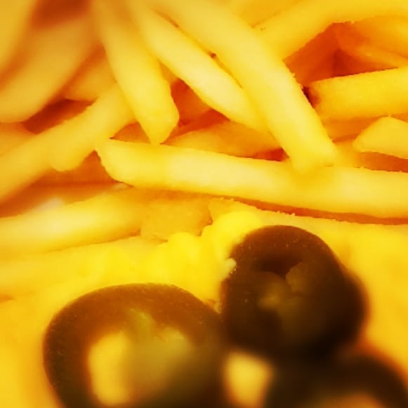 French fries with or without cheddar cheese & jalapeno